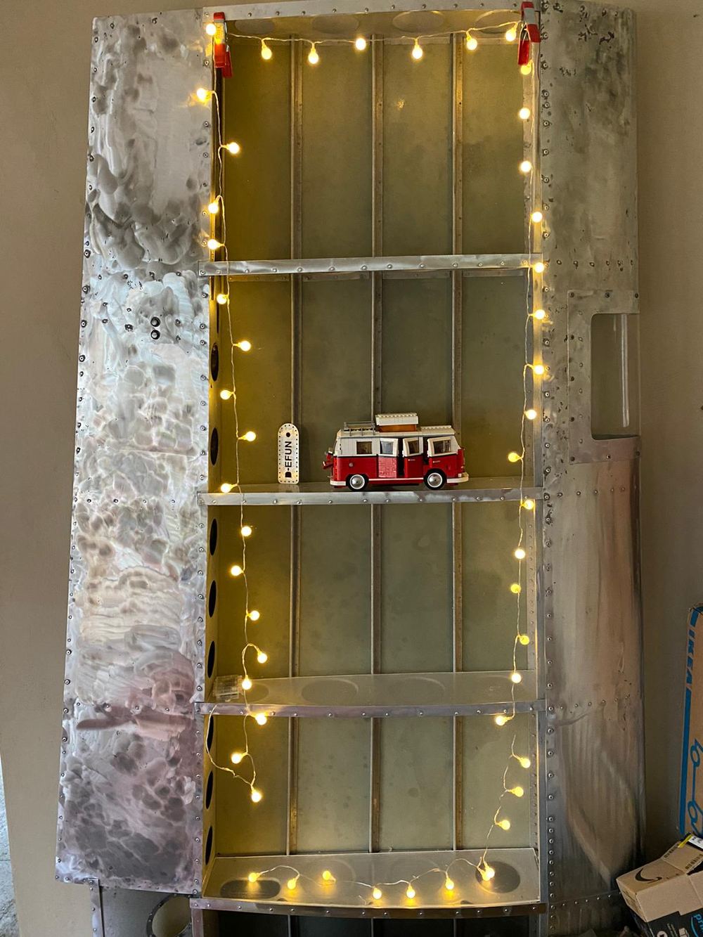 Control-surface shelf with string lights