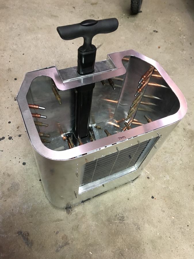 Solar and handle: The solar panel goes into the front skin; the trolley handle gets its own channel.