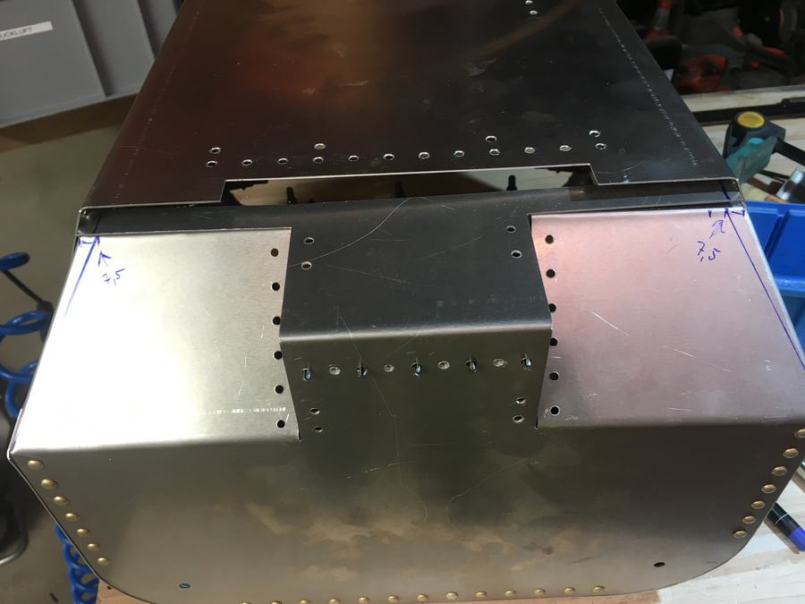 The lid: Lid parts marked, bent and fitted around the handle recess.