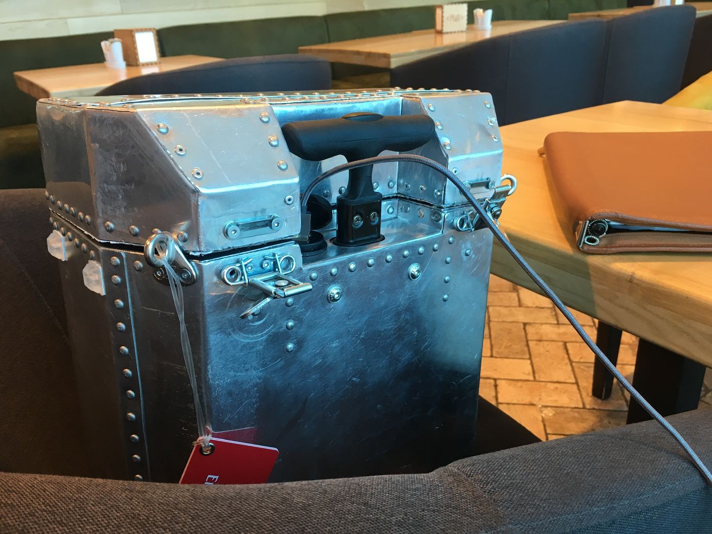 Close-up of the riveted Taildragger with its handle and latches