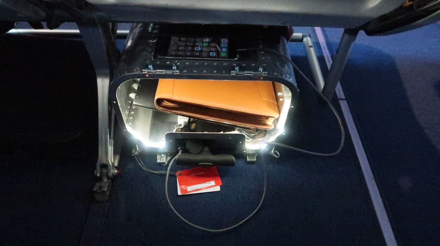 The Taildragger open under the seat with its lid hinged up